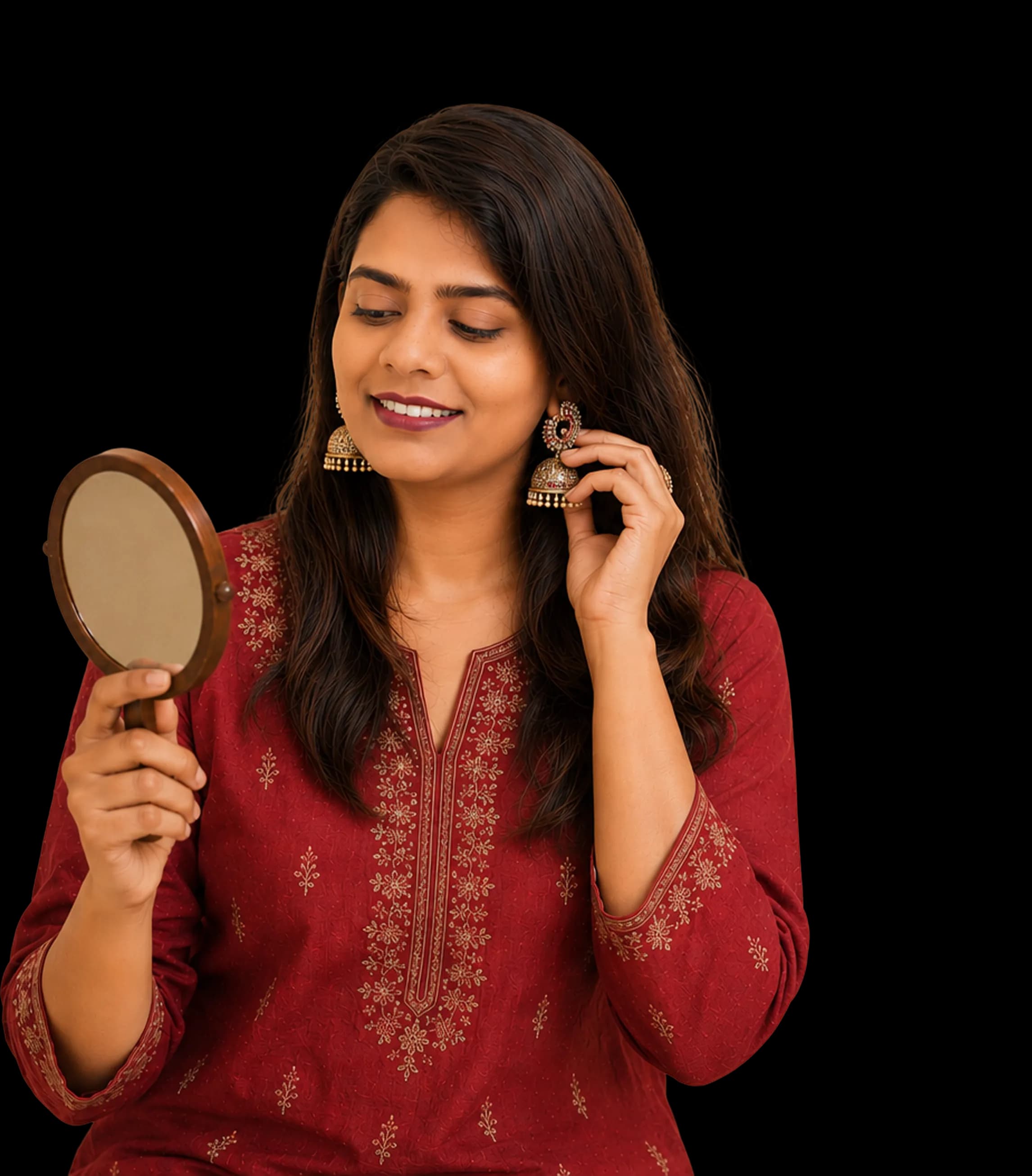 A customer trying on jhumka earrings from her Haaty order